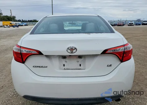 2015 Toyota Corolla L from USA, damaged, VIN 5YFBURHE4FP242001